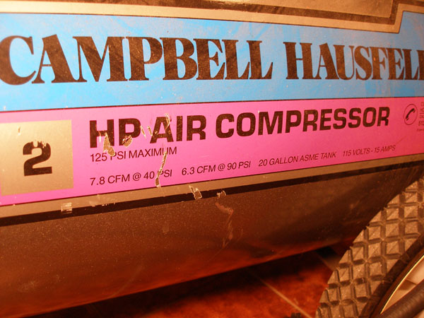 Close-up of the air compressor label